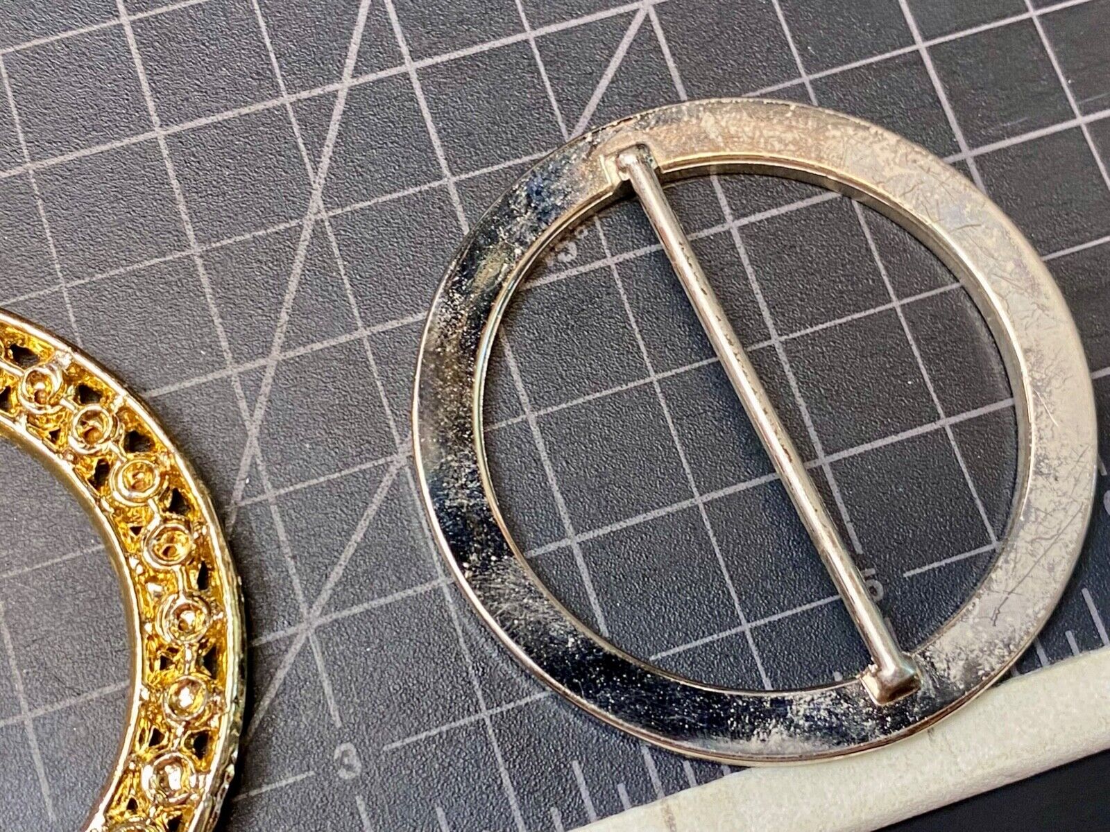 Two piece lot of antique Rhinestone covered round scarf slides