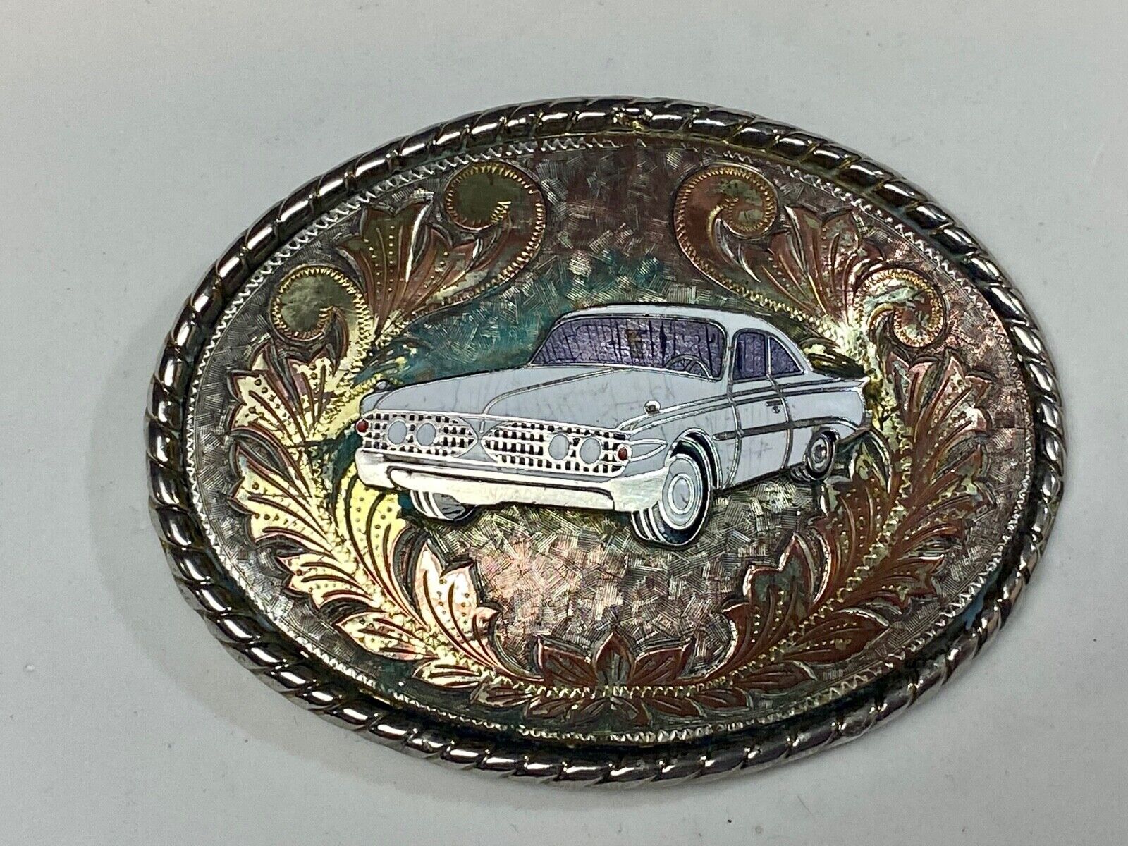 A custom Pimped out retro 70's Car - a caddy? on a western belt buckle signed W!