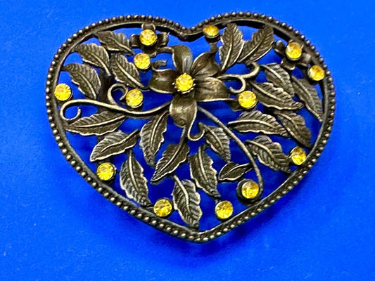 Beautiful see through Heart shaped belt buckle with yellow rhinestone accents