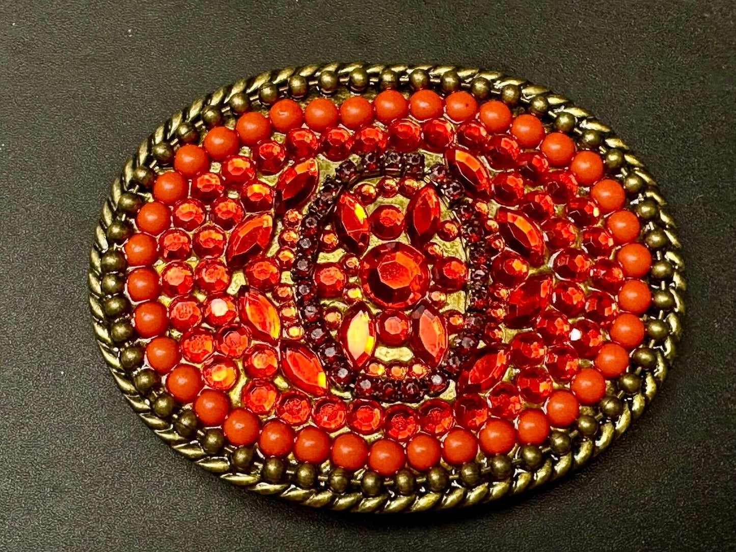 Unique Shades of Red - Mixed Materials oval outlined Belt Buckle