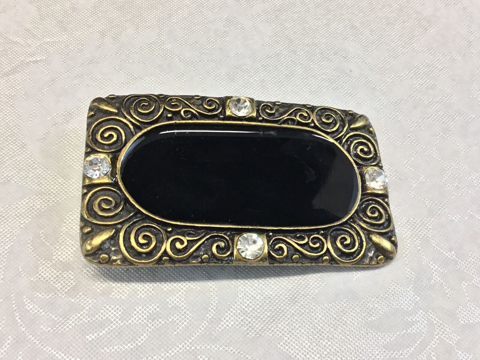 3.5".  Designer / western / dress / Black and brass tone rhinestone belt buckle