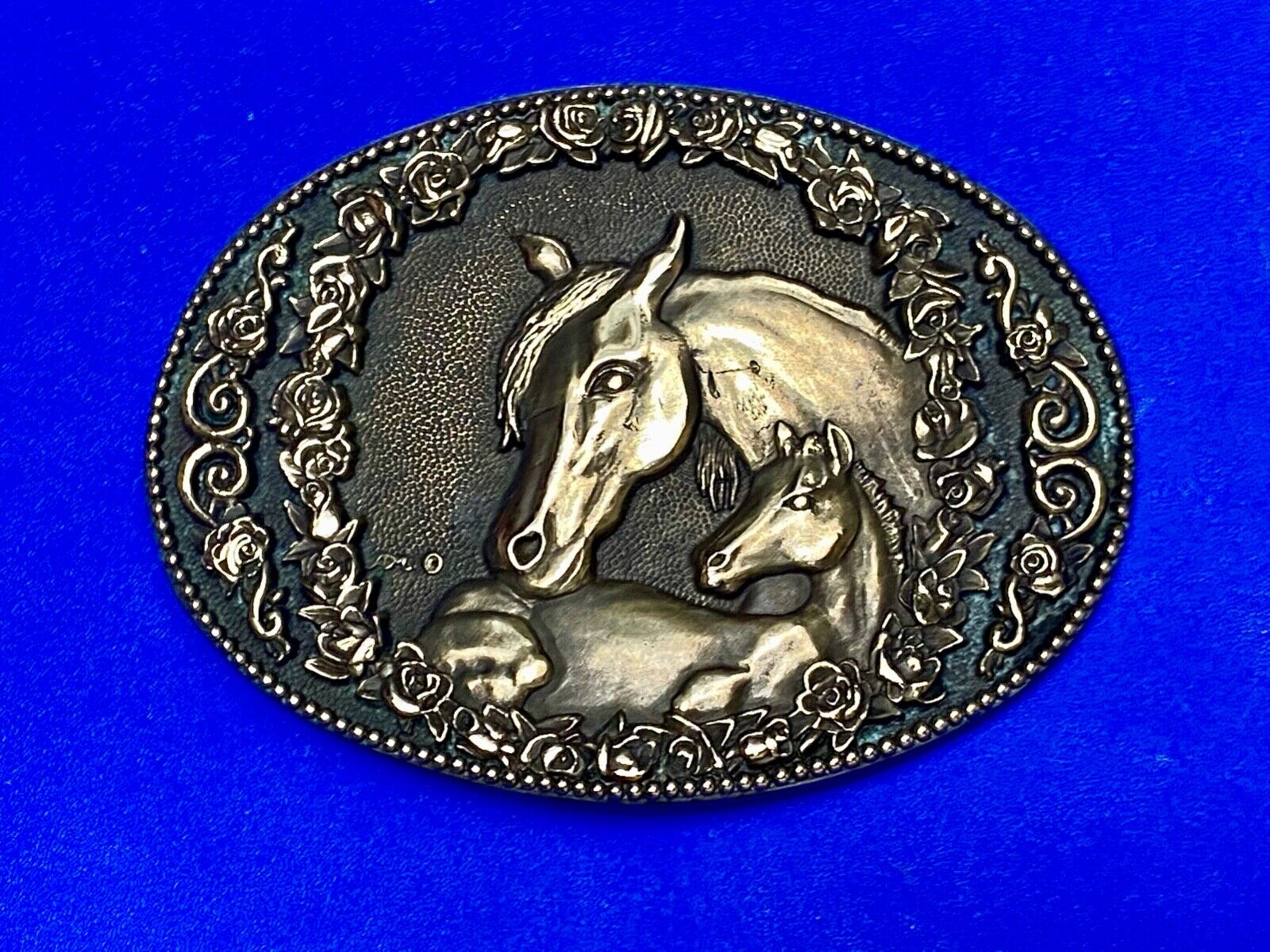Two horse heads First addition brass belt buckle by Award Design Medals