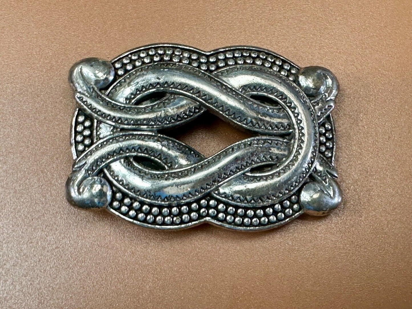 Vintage knot pattern see through silver tone belt buckle