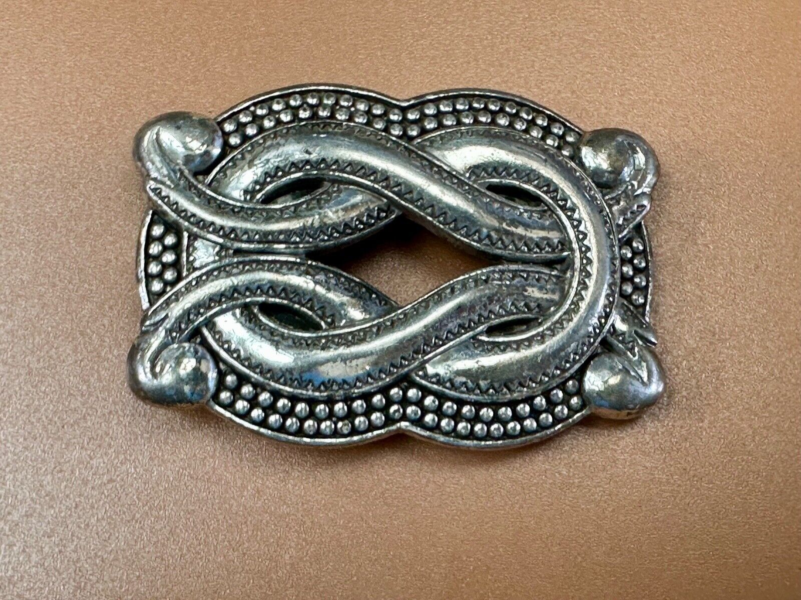 Vintage knot pattern see through silver tone belt buckle