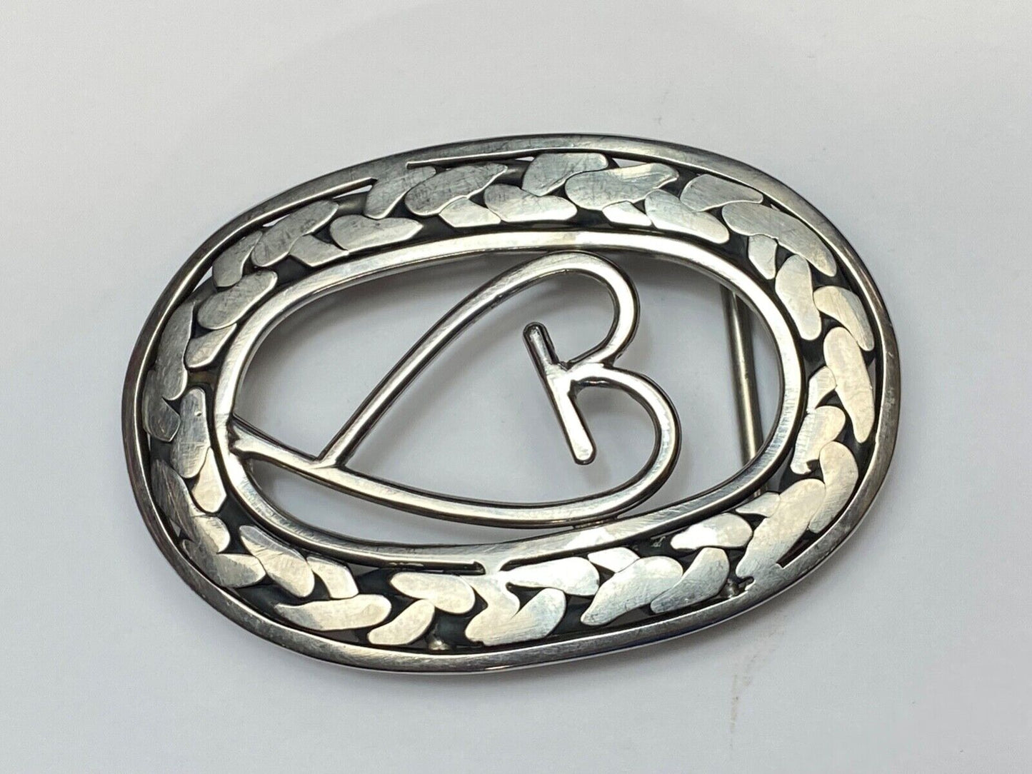 Artisan Beautiful Heart inside of open oval flower Art belt buckle