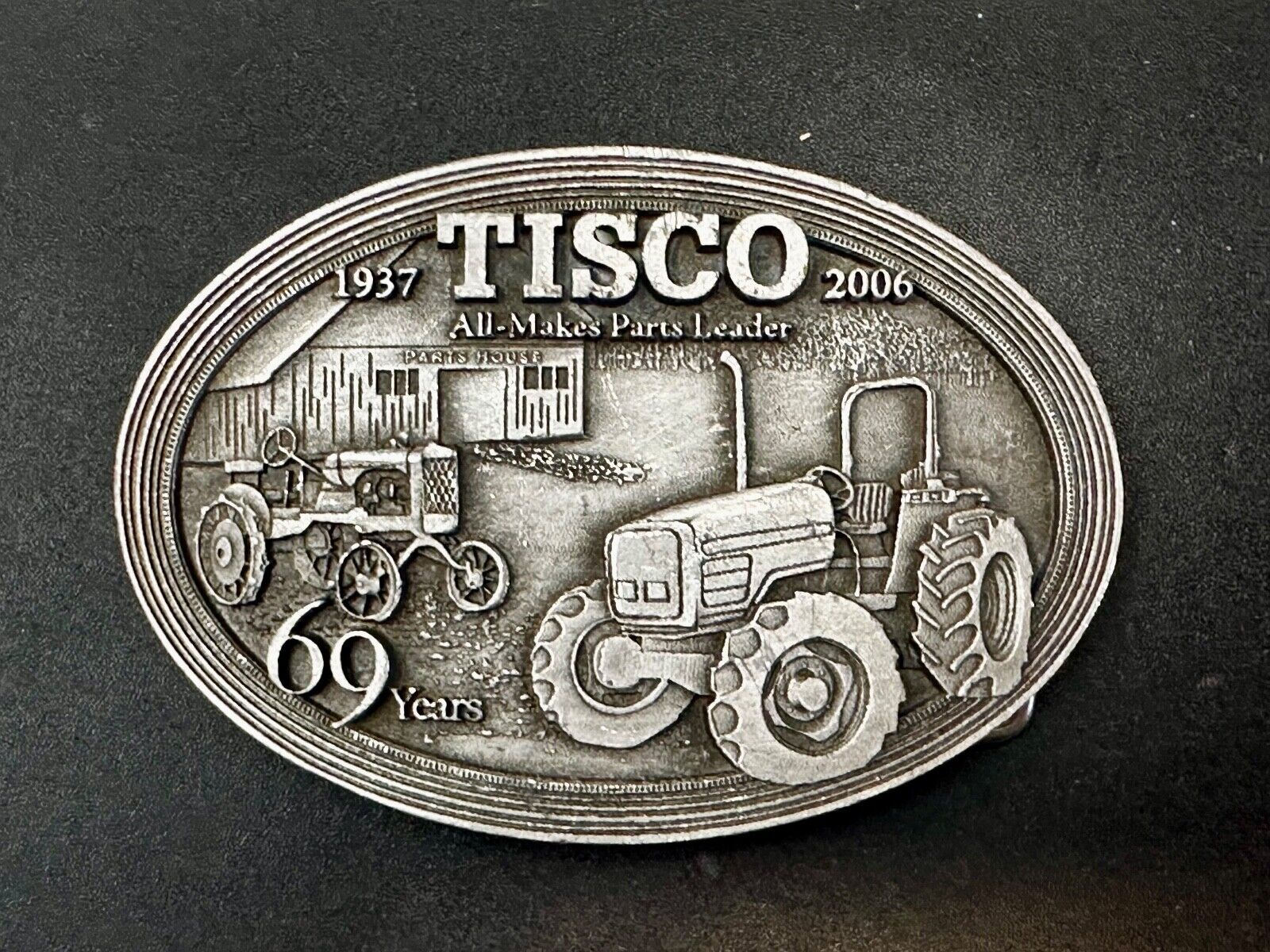 TISCO Tractor Implement Supply Replacement Parts 69 years - 2006 Belt Buckle