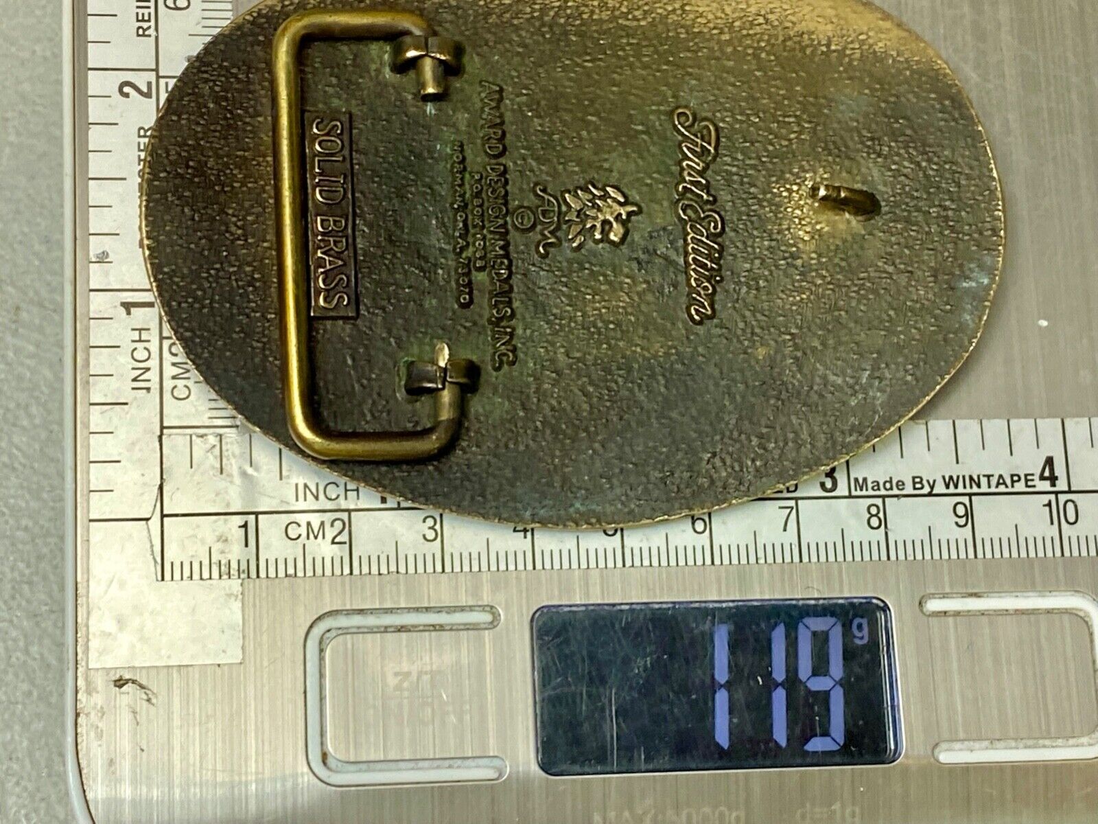 Two horse heads First addition brass belt buckle by Award Design Medals
