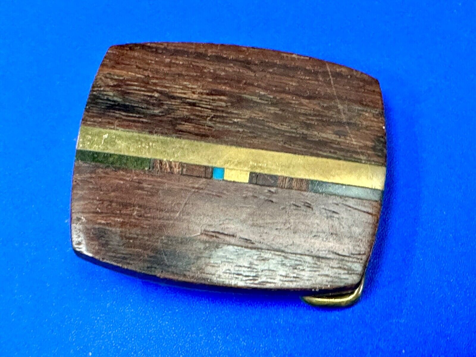 turquoise and solid brass inlay to exotic wood Scorpion Products Div belt buckle