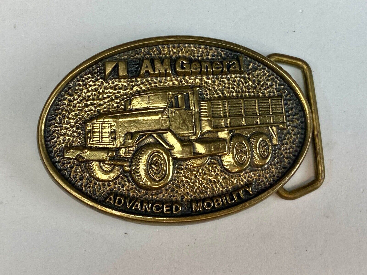 AM General Advanced Mobility belt buckle 2nd in a collector series 5 Ton Trucks 