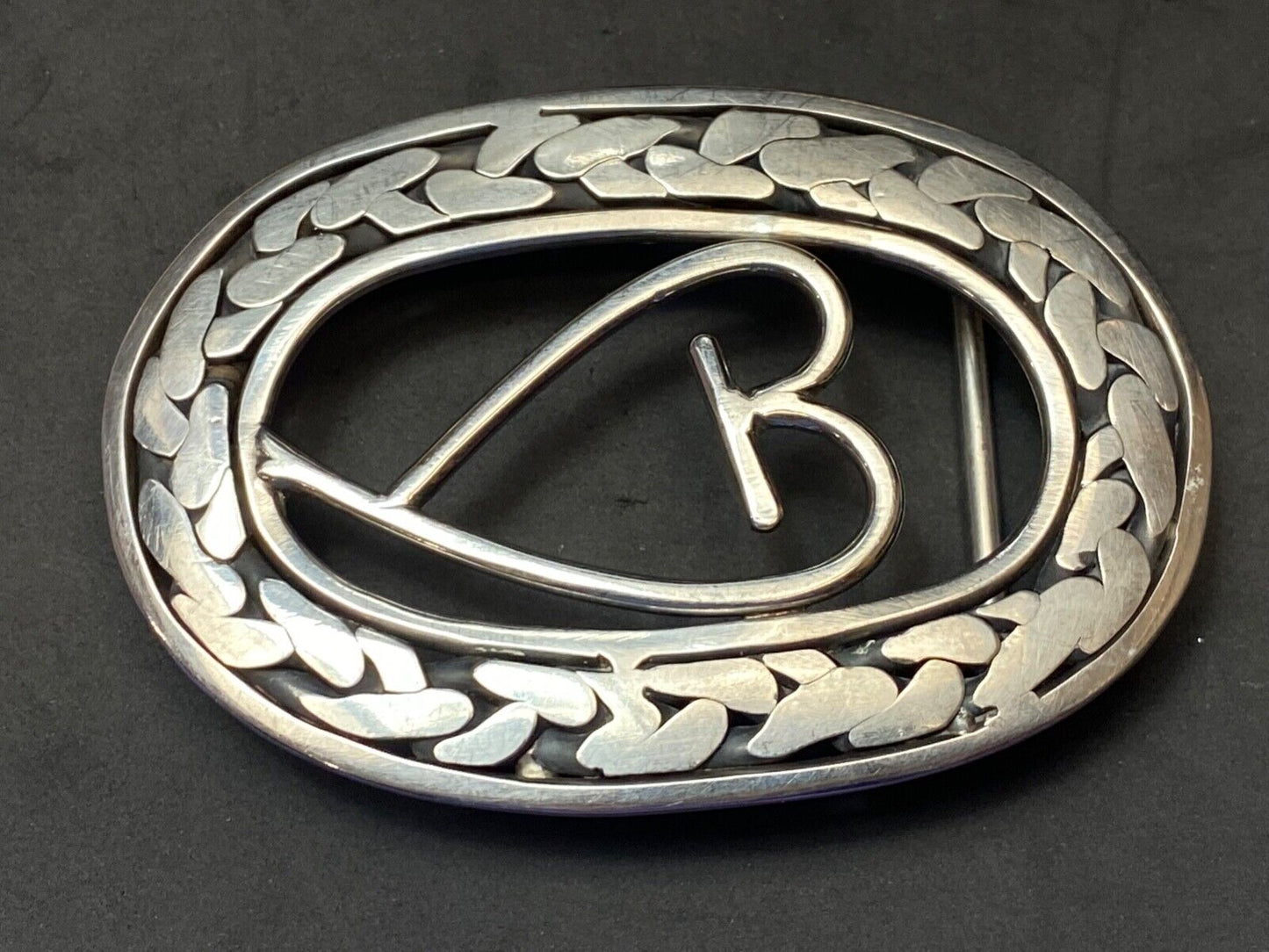 Artisan Beautiful Heart inside of open oval flower Art belt buckle