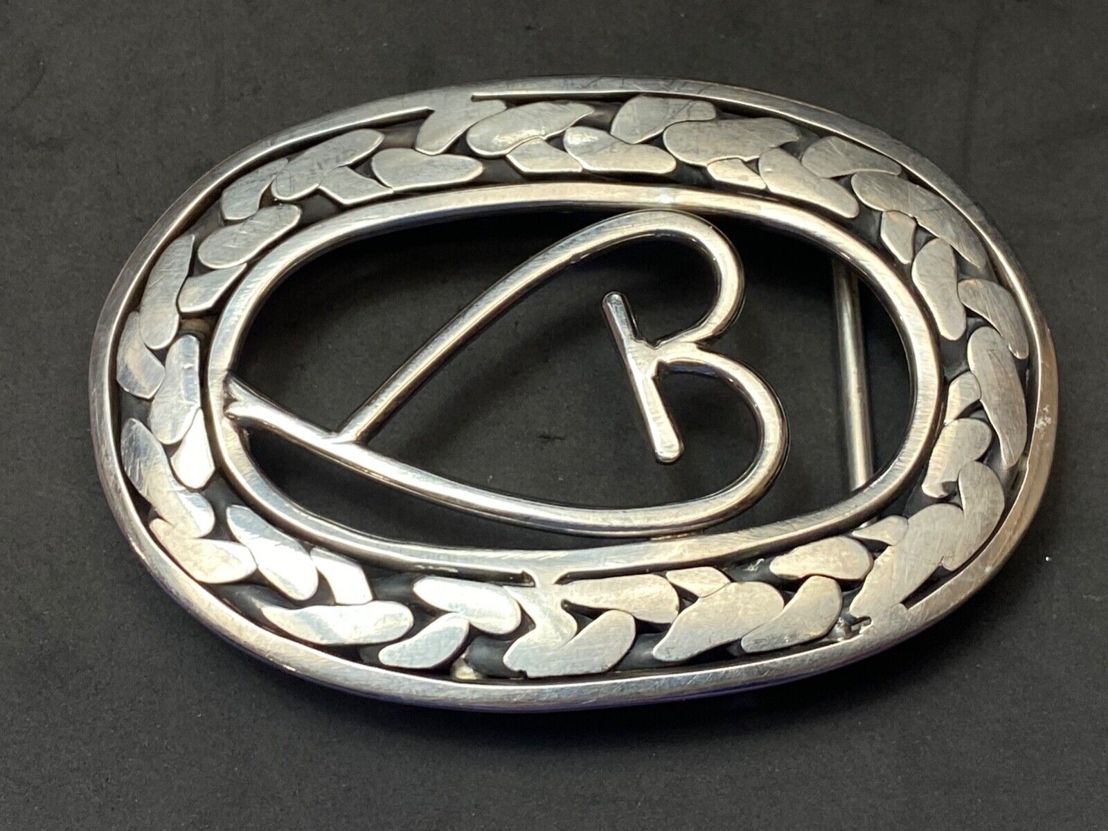 Artisan Beautiful Heart inside of open oval flower Art belt buckle