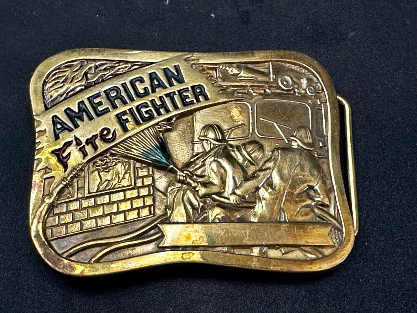 American Firefighters at work putting out fire Vintage 1981 Baron Belt Buckle
