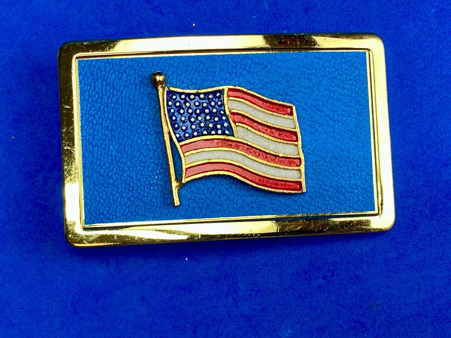 United States of America FLAG raised western belt buckle blue background 