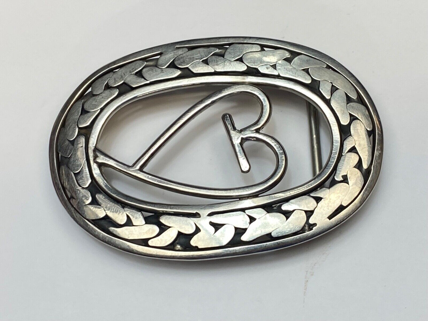 Artisan Beautiful Heart inside of open oval flower Art belt buckle