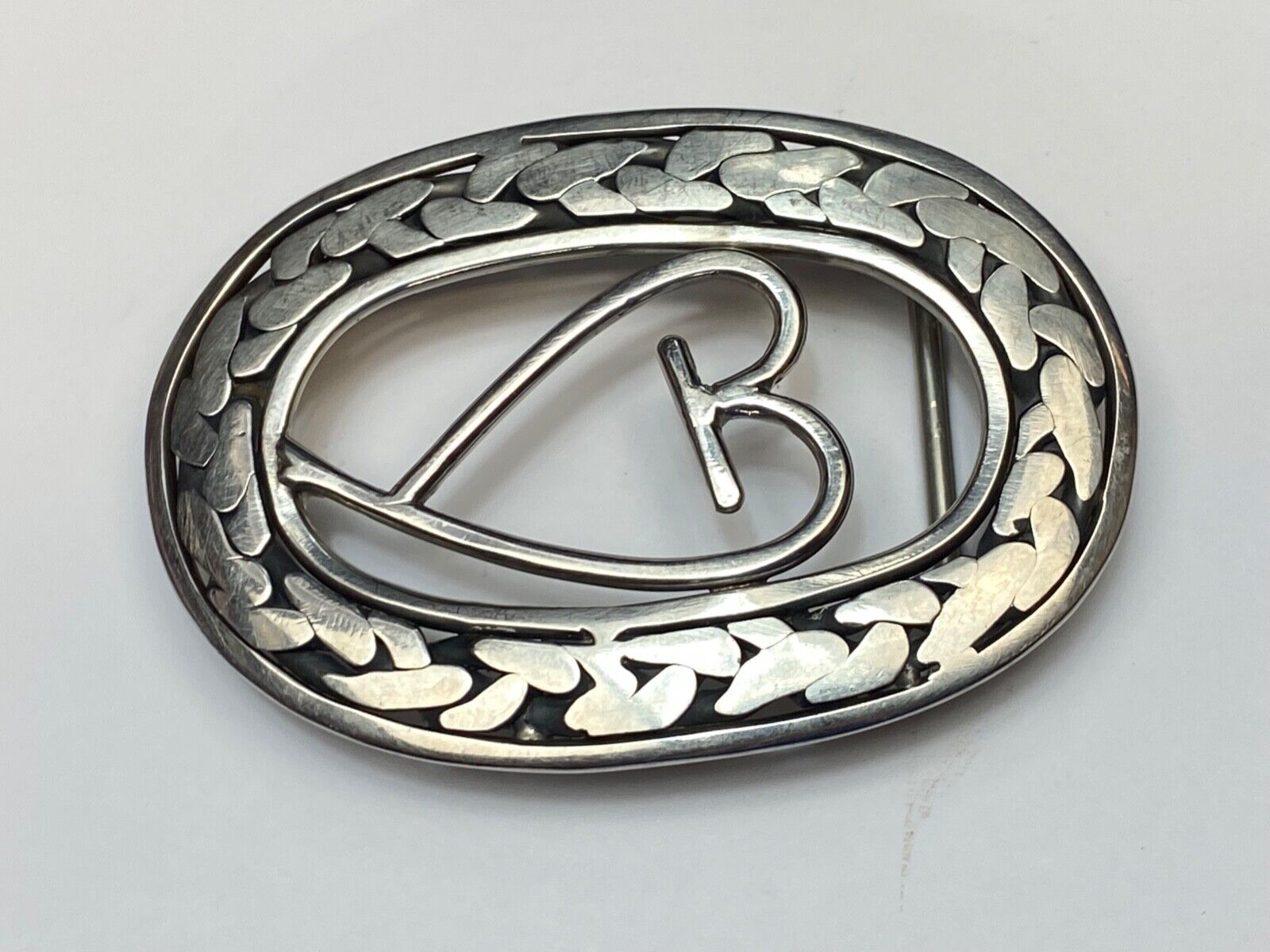 Artisan Beautiful Heart inside of open oval flower Art belt buckle