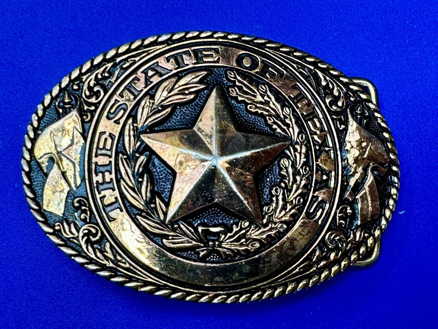 TEXAS State Pride - RAISED 3D STAR centered in brass tone oval Belt Buckle