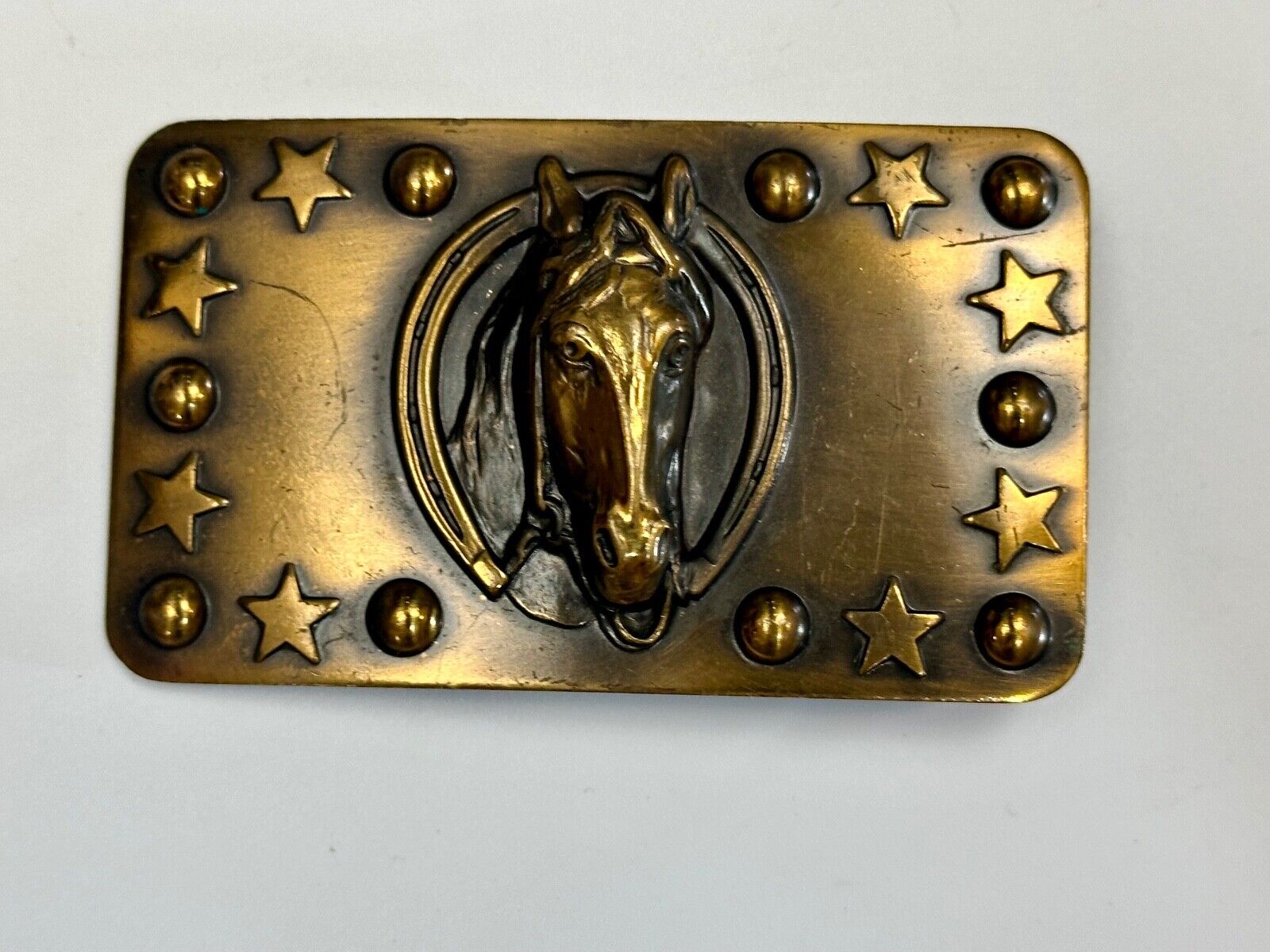 Vintage Horse head belt buckle with stars and circles boarder