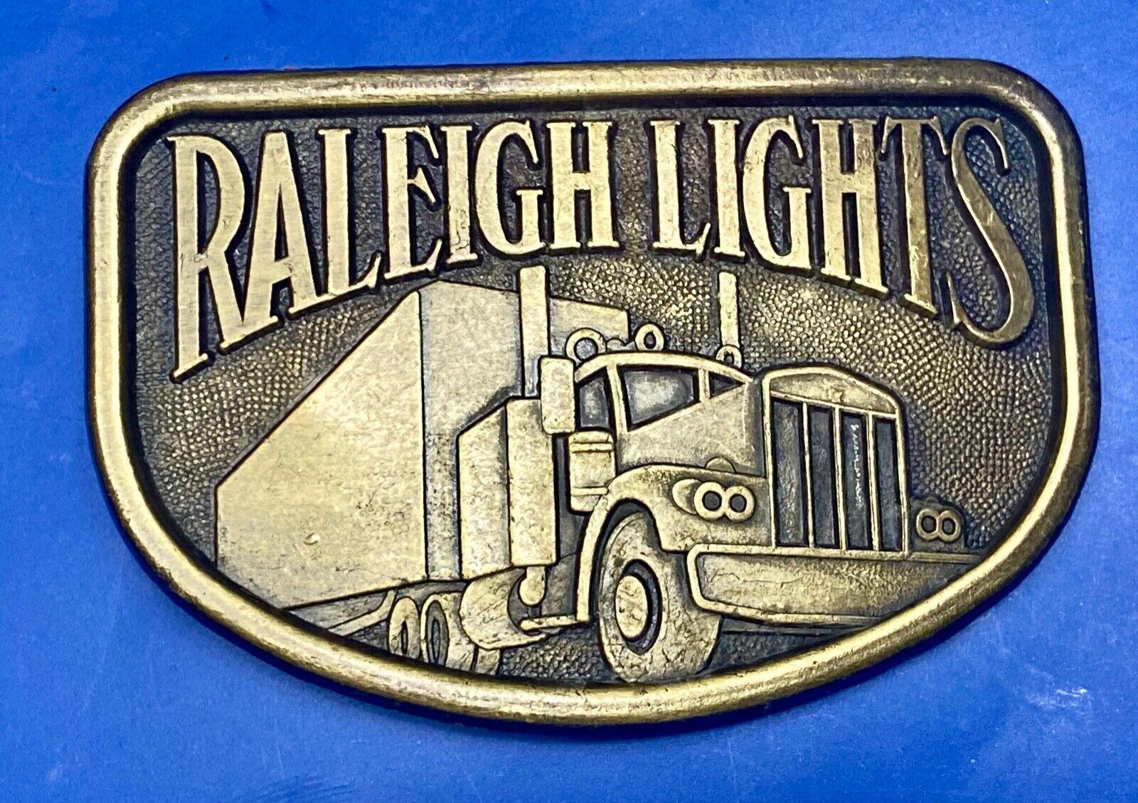 1970s Vintage Raleigh Lights Semi Truck Trucker Brass Tone Belt Buckle by RJ