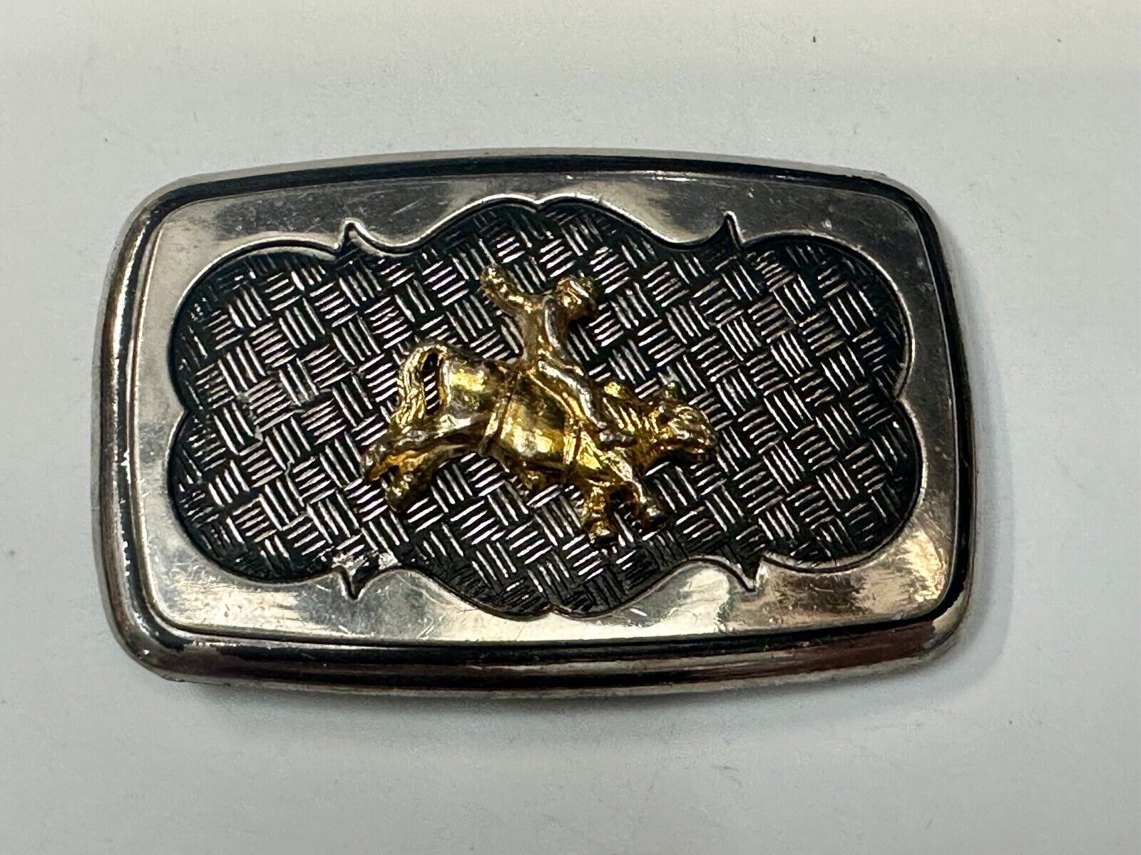 Vintage Cowboy Saddle Bronc western belt buckle with mesh background!