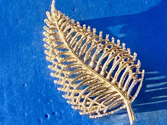 SWP INC signed Gold tone skeleton see through leaf brooch 