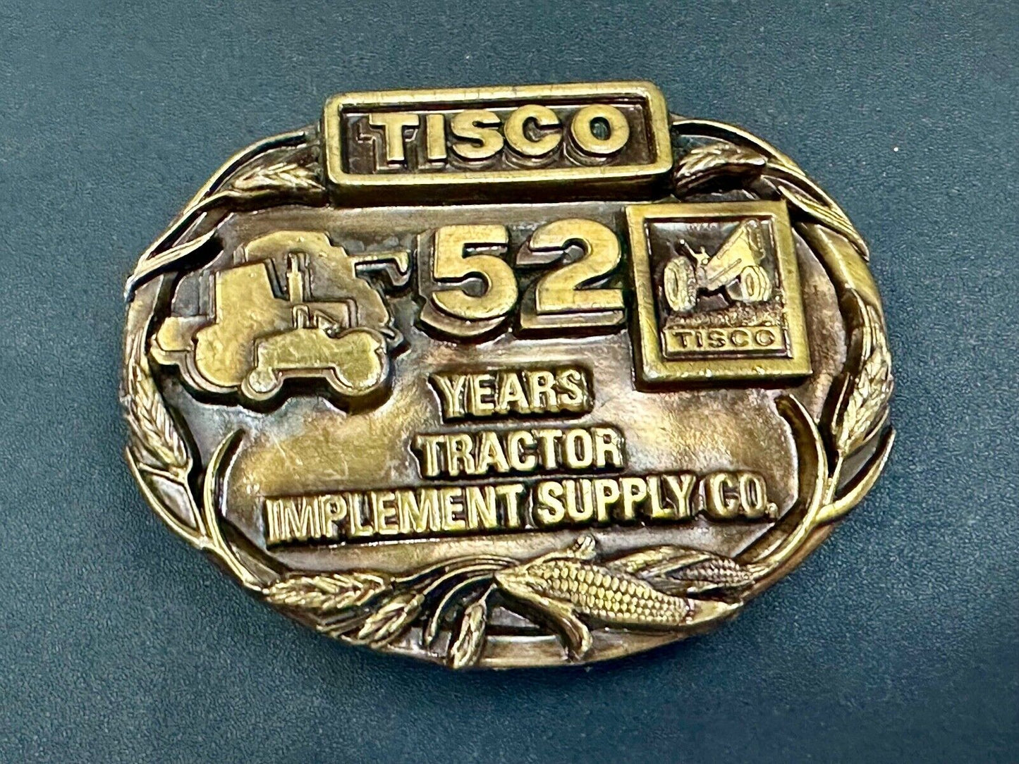 TISCO 52 years commemorative belt buckle  Tractor Implement Supply