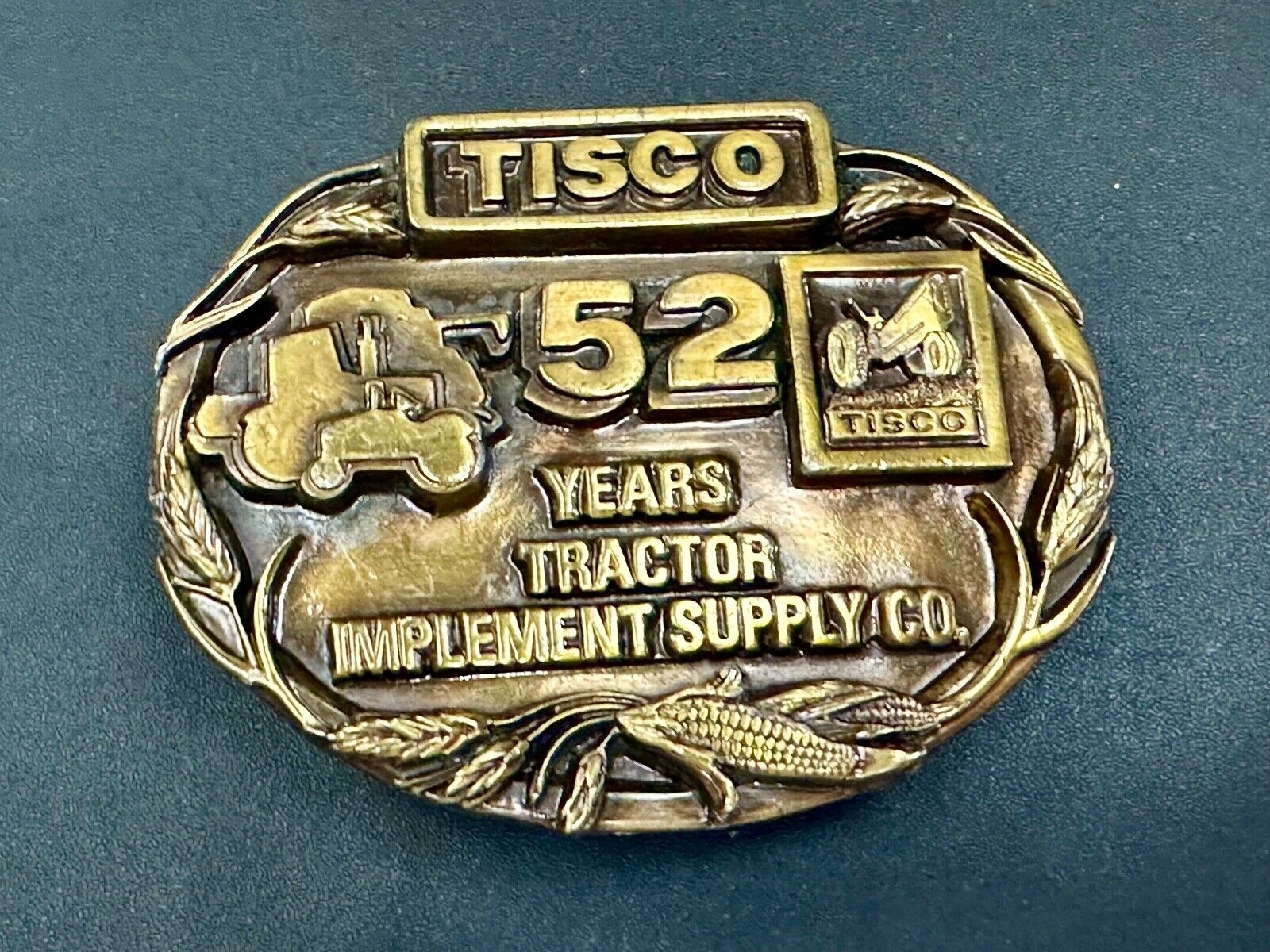 TISCO 52 years commemorative belt buckle  Tractor Implement Supply