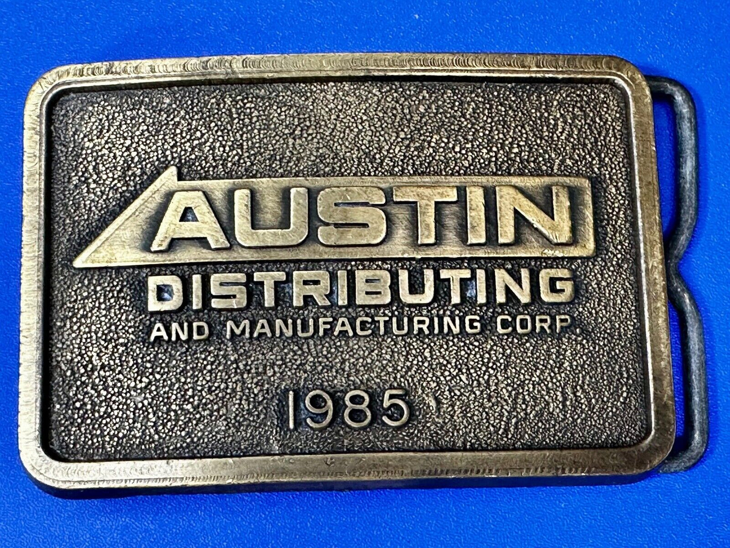 Austin Texas Distributing and Manufacturing 1985 Advertisement Promo Belt Buckle