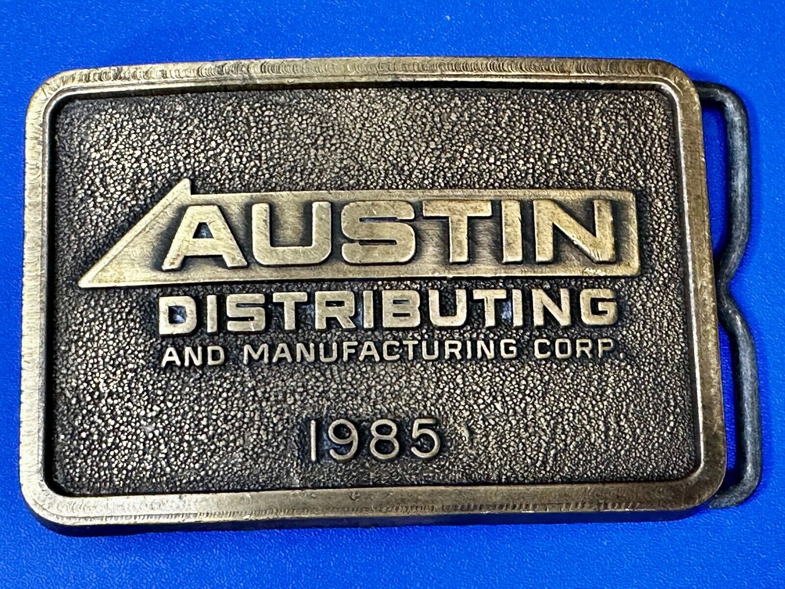 Austin Texas Distributing and Manufacturing 1985 Advertisement Promo Belt Buckle