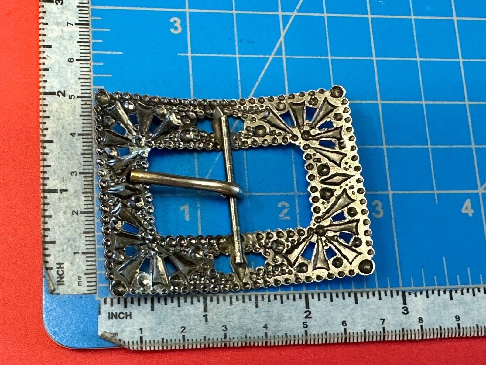 Antique silver color rectangular see through ornate belt buckle
