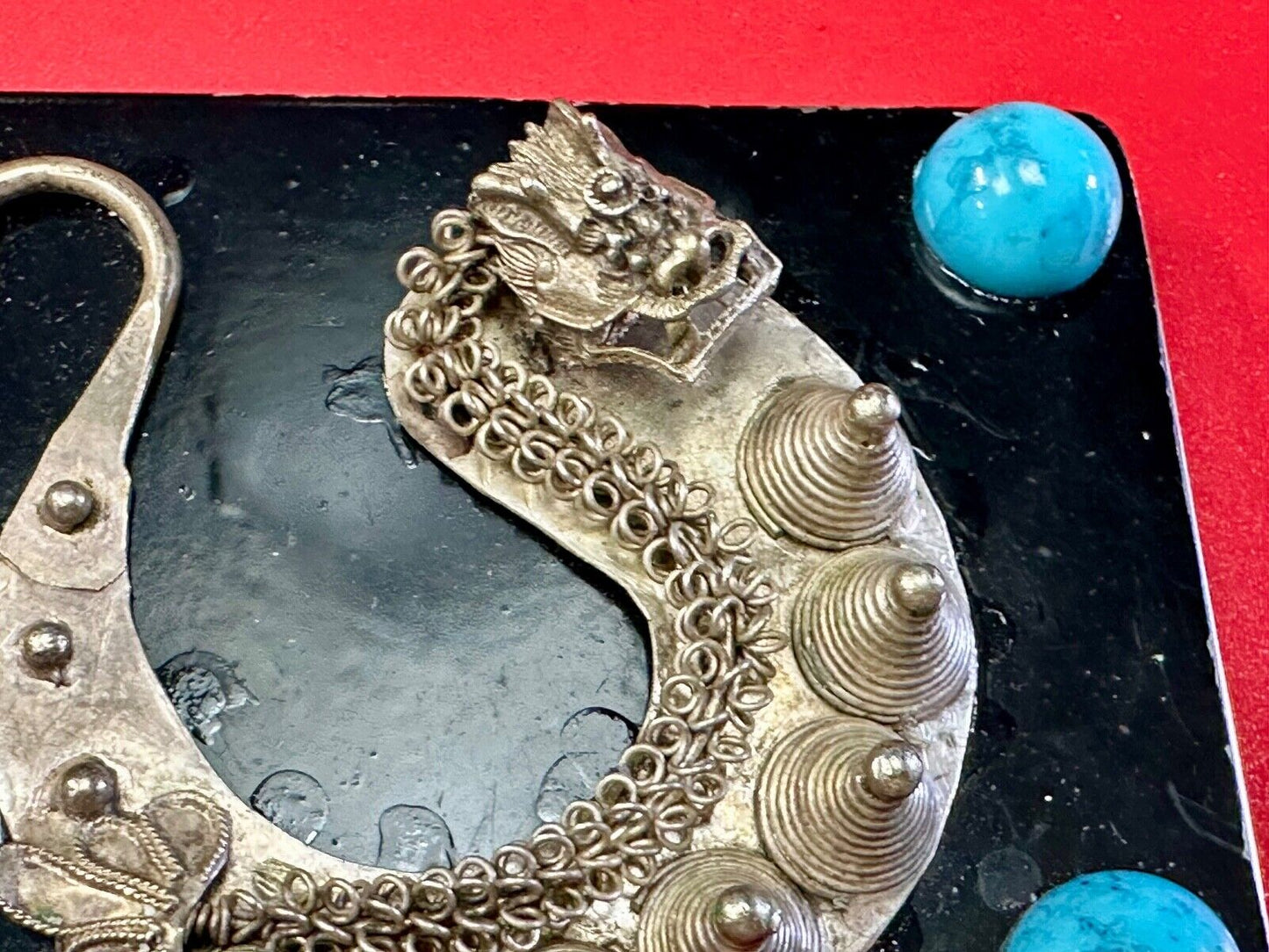 Artisan Dragon theme rectangular belt buckle with turquoise colored corner accts