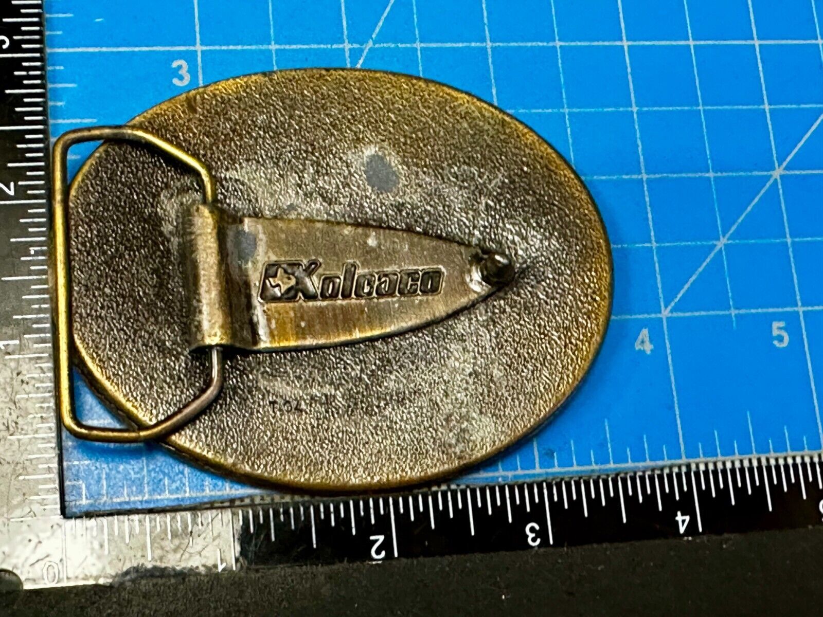 Texas Home of the Armadillo Commemorative Red colored Belt Buckle by Koleaco