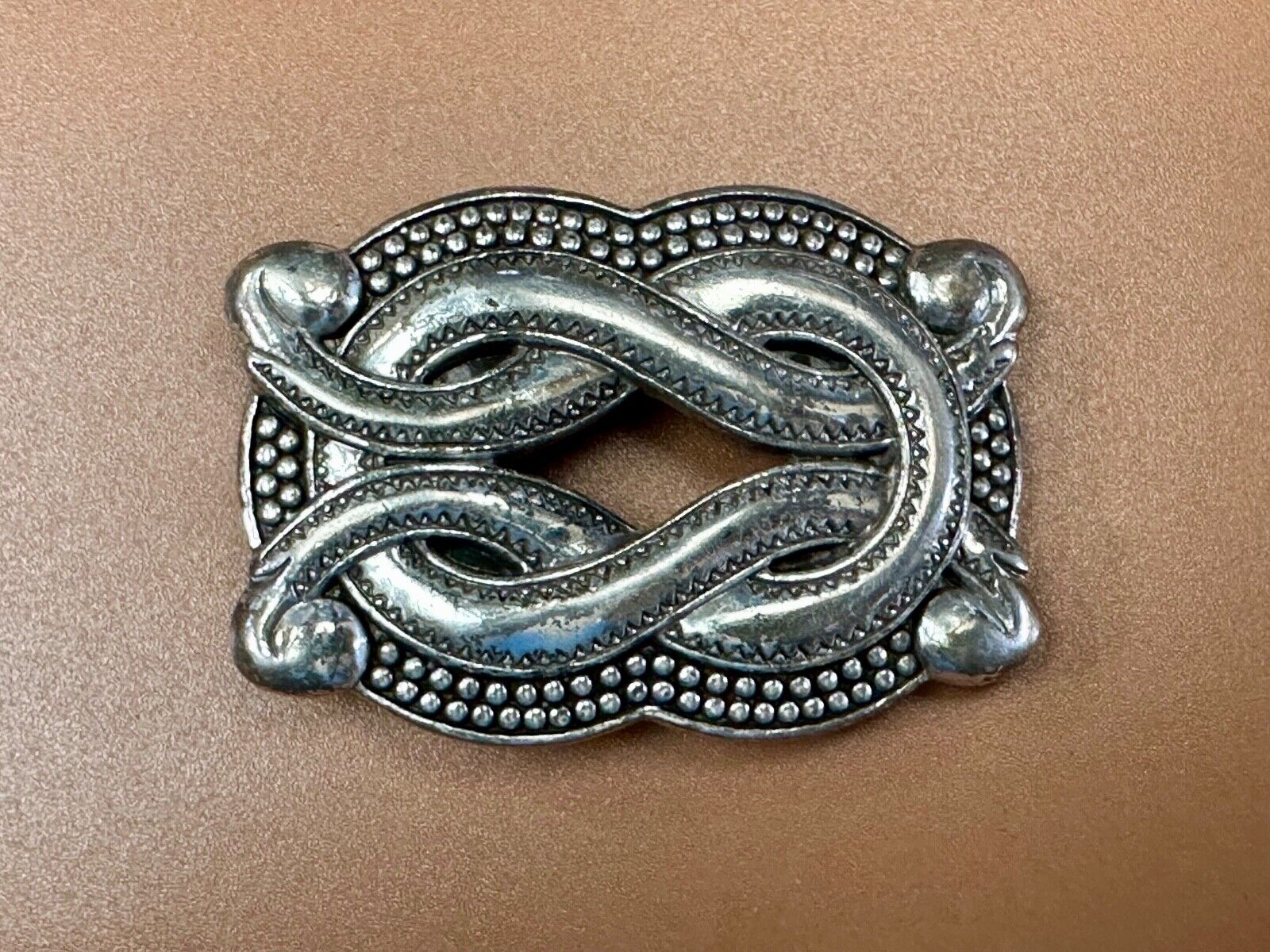 Vintage knot pattern see through silver tone belt buckle