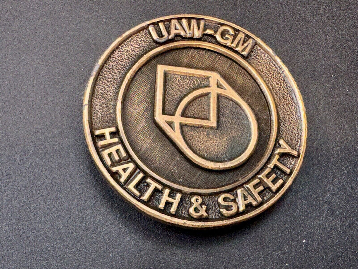 UAW-GM auto workers union round Health & Safety Award belt buckle