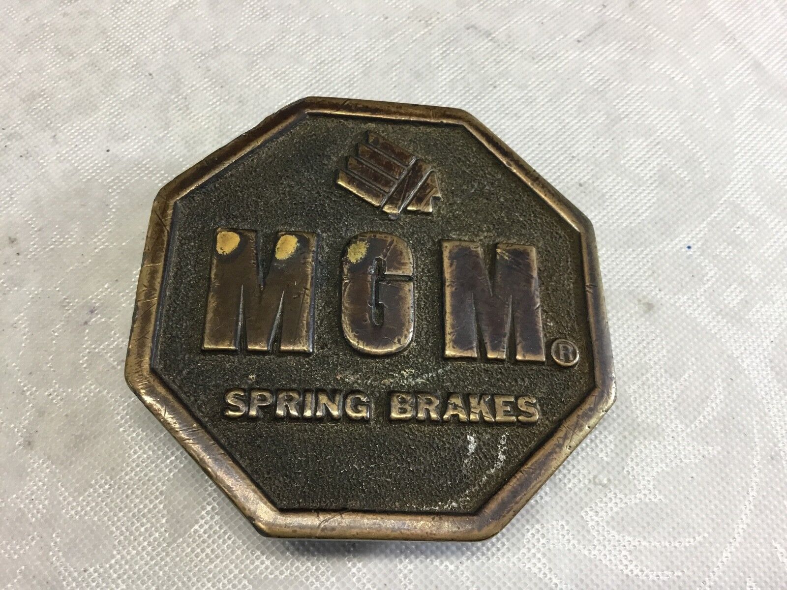 VINTAGE 1977 **MGM SPRING BRAKES** COMPANY BELT BUCKLE