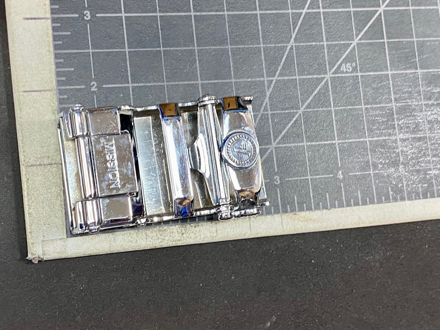 Unknown to me, Cream & silver color lines automatic slide belt buckle   U?  V?  