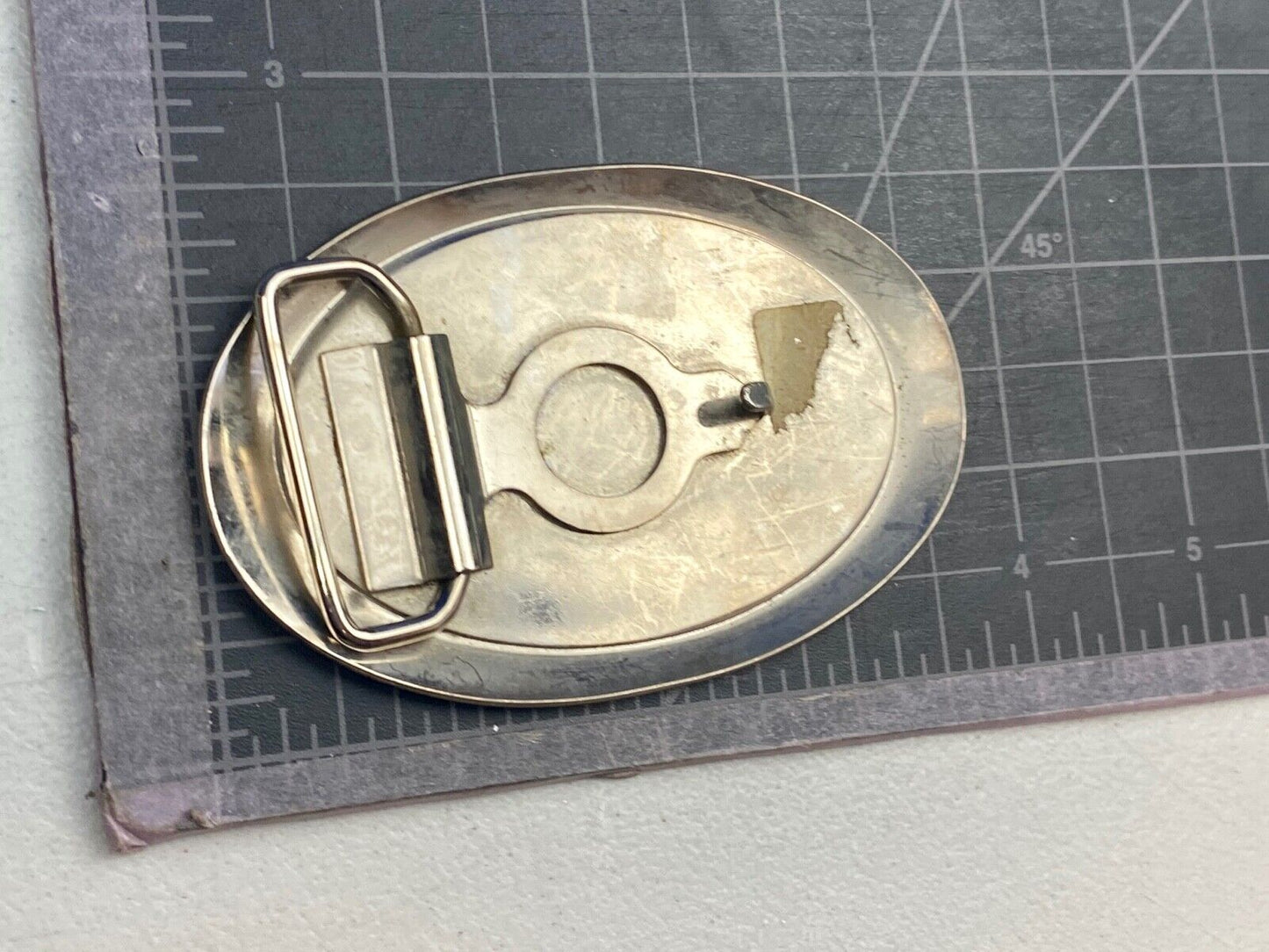 Unique XXX gold tone belt buckle tic tac toe pattern
