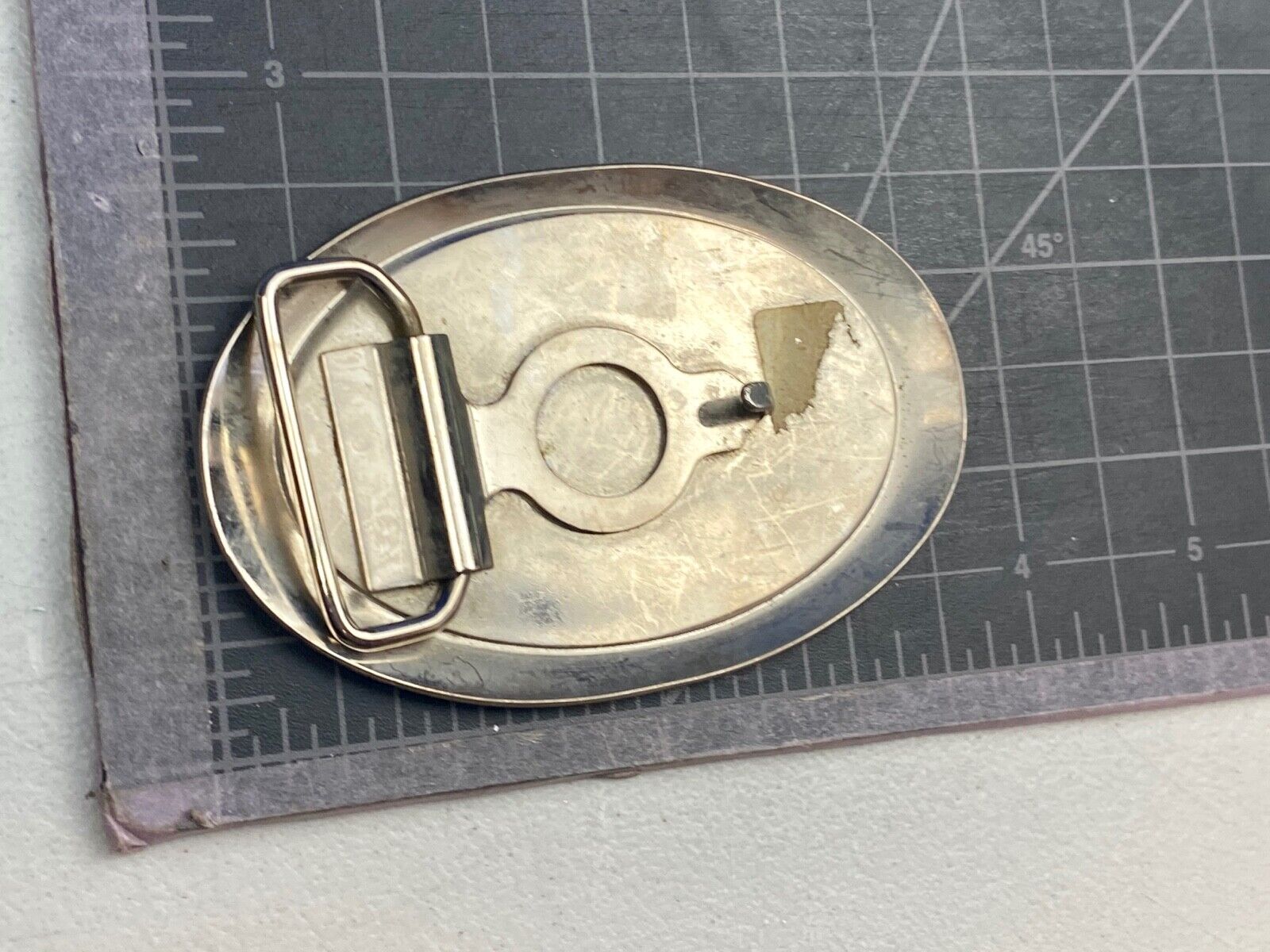 Unique XXX gold tone belt buckle tic tac toe pattern