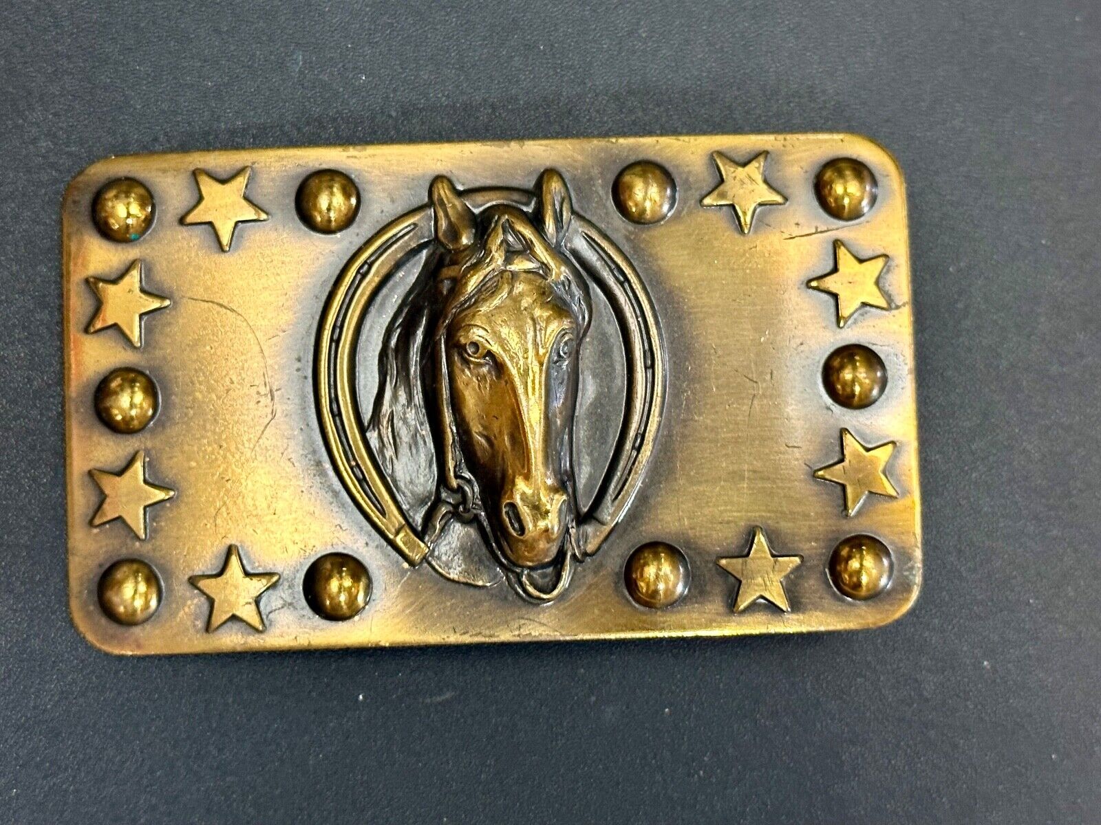 Vintage Horse head belt buckle with stars and circles boarder