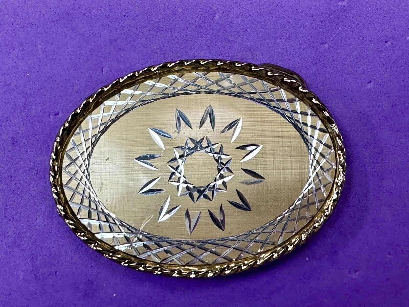 vintage gold tone starburst design oval belt buckle marked W