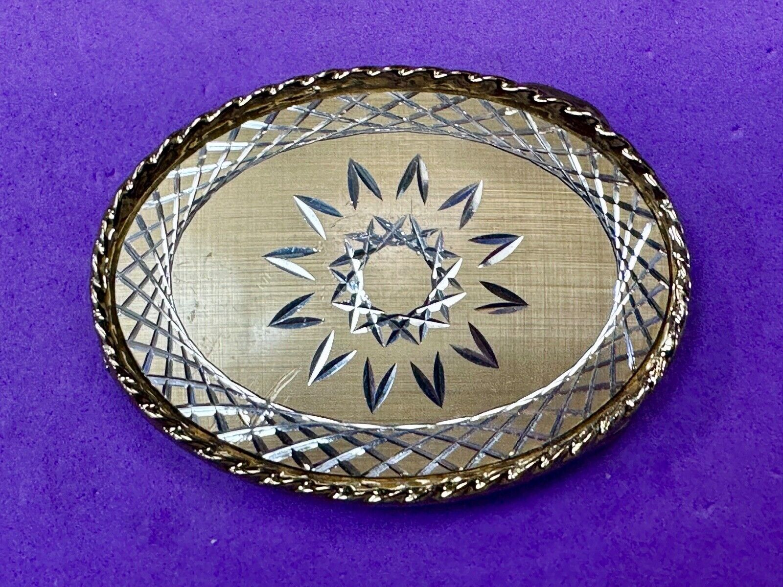 vintage gold tone starburst design oval belt buckle marked W