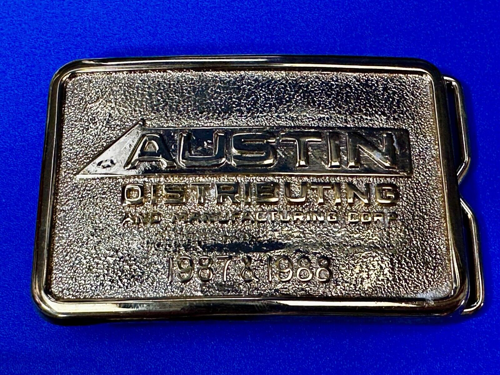 Austin Texas Distributing and Manufacturing 1987 - 1988 Gold Tone Belt Buckle