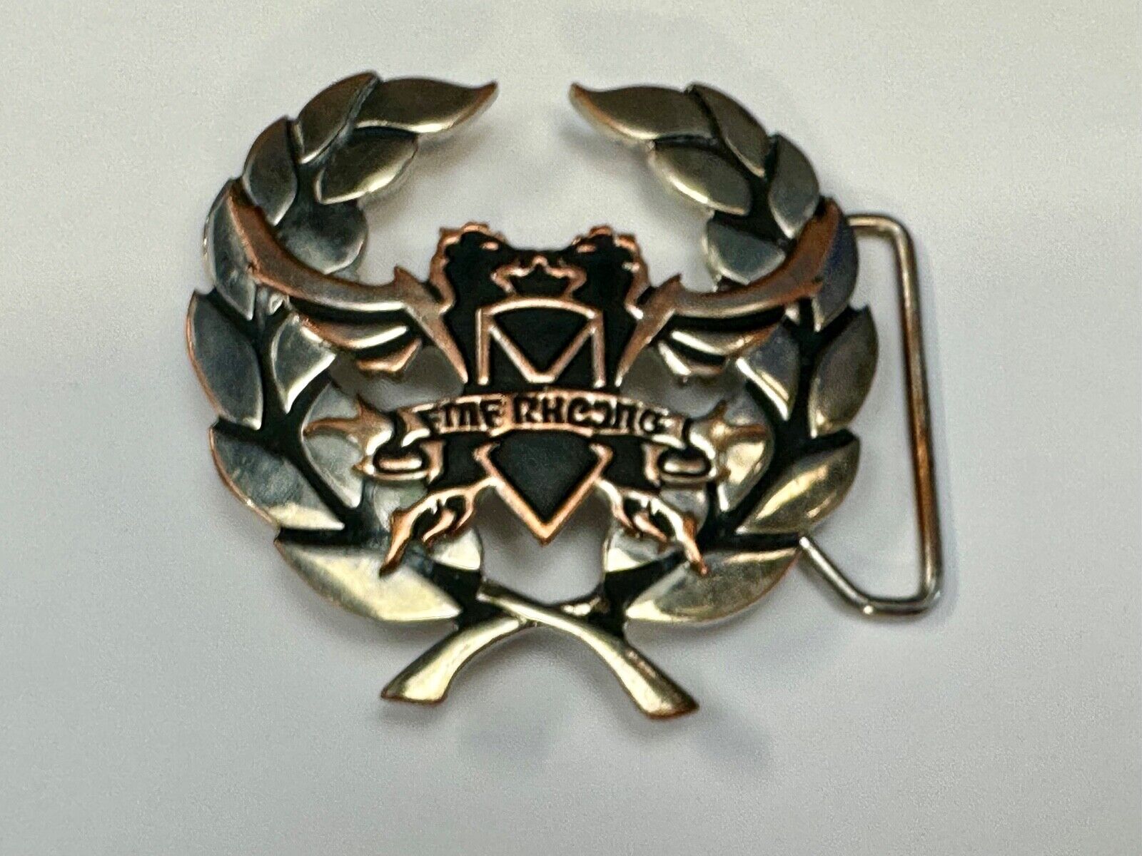 Two griffins?  FME RheJNG Olive branch cutout belt buckle