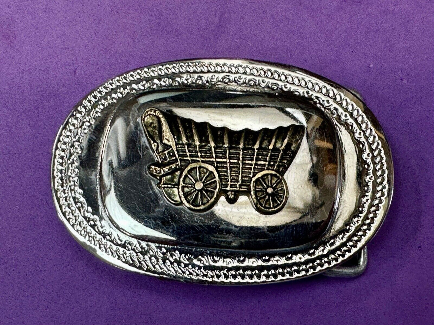 70s Covered Wagon two tone reflective oval ornate boarder belt buckle
