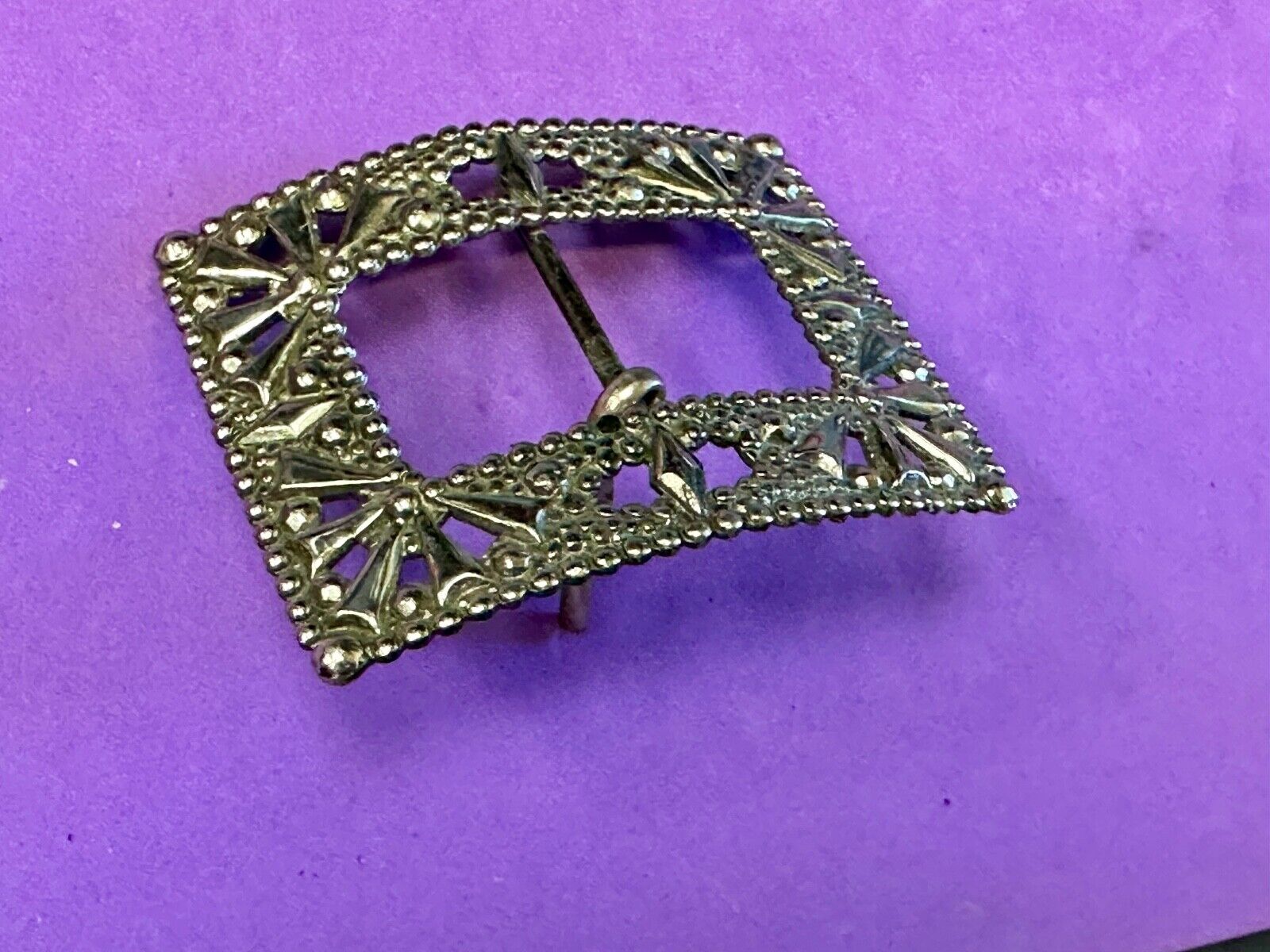 Antique silver color rectangular see through ornate belt buckle