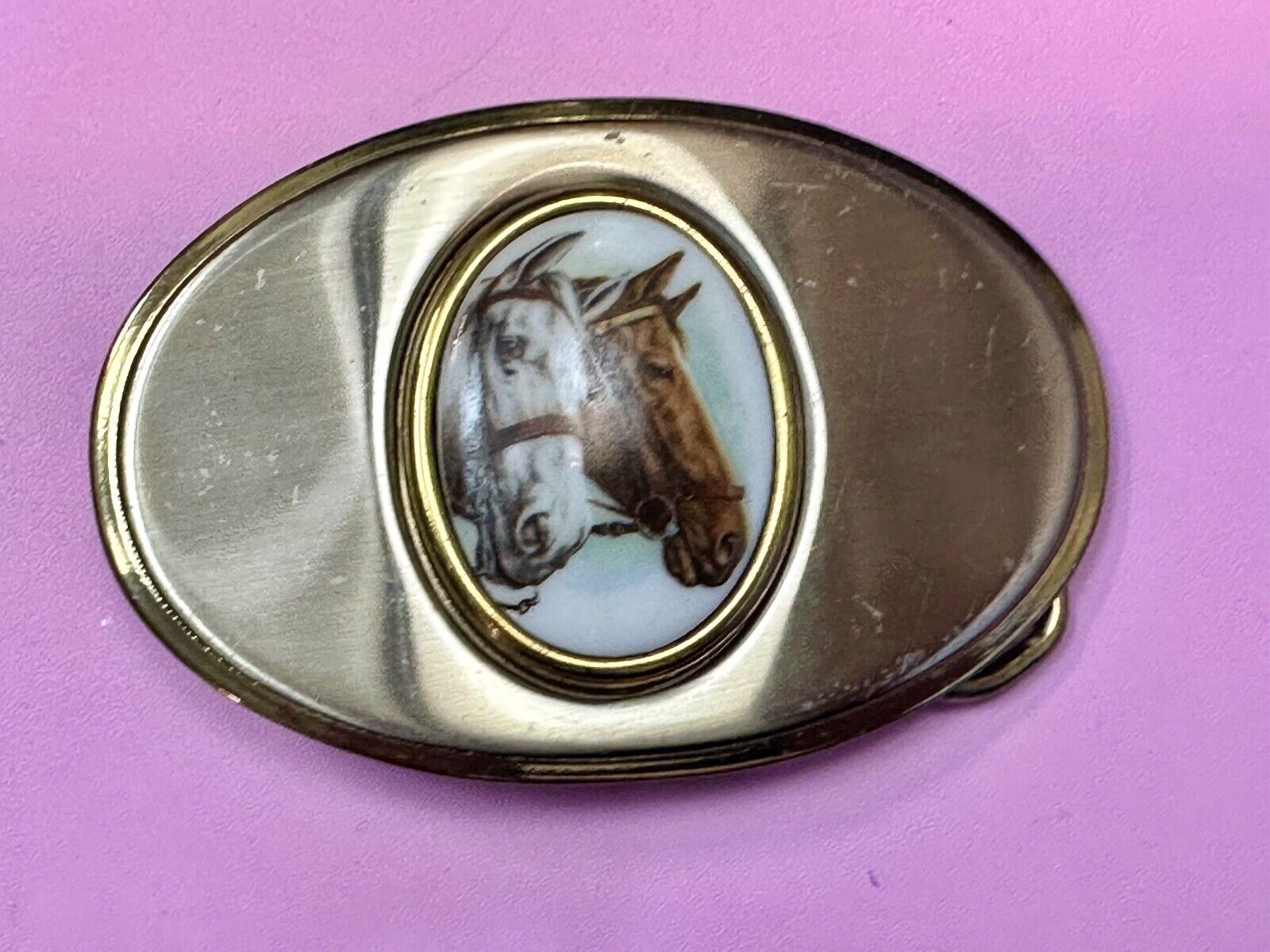 Two horse head picture in oval smooth gold tone Vintage Belt Buckle