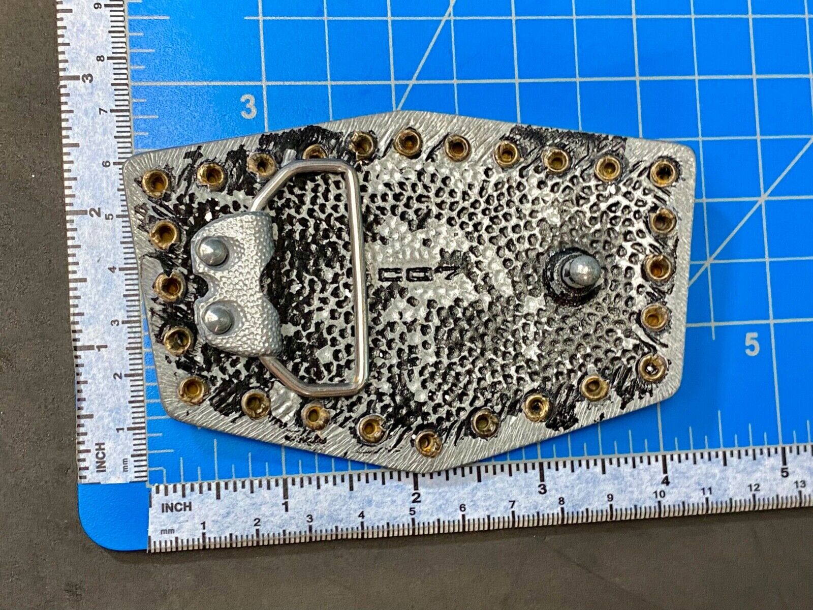 used metal studded black faded paint belt buckle for your craft or project