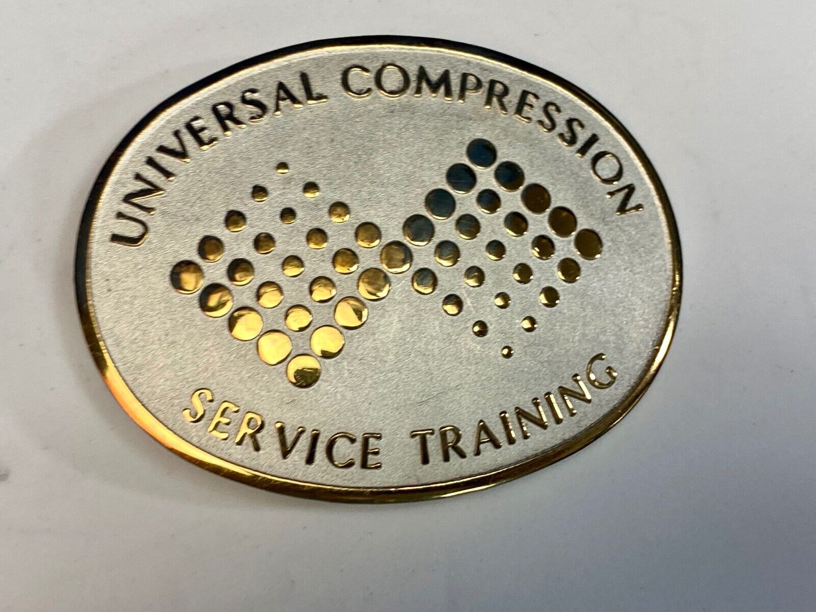 Universal Compression Service Training Company Award Belt Buckle