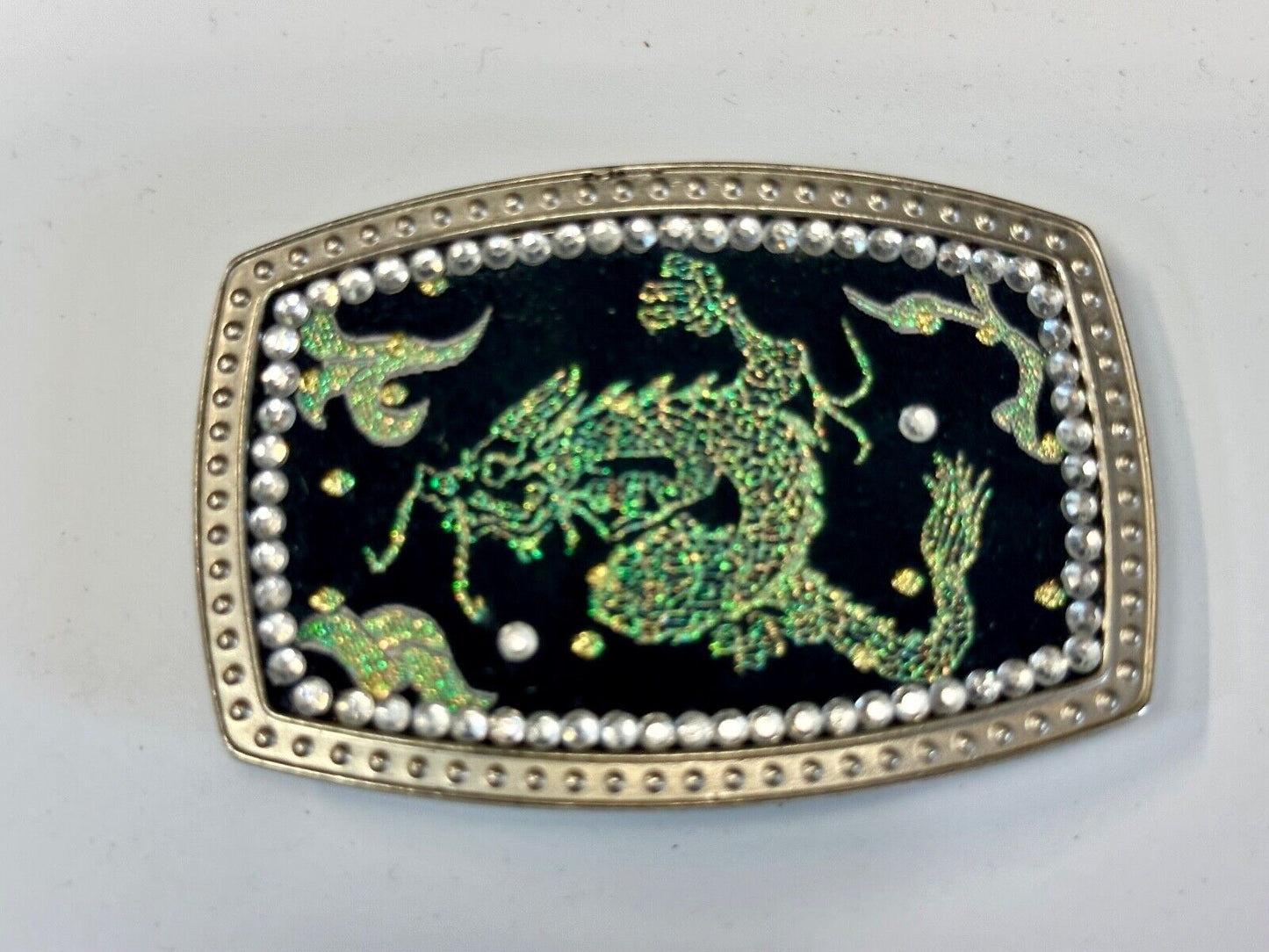 Chinese Dragon pattern symbol on silver tone rhinestone accented belt buckle