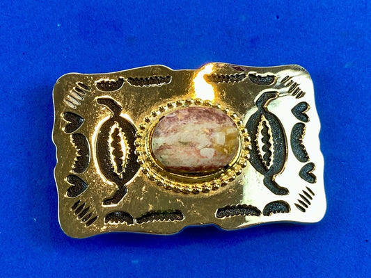 unknown multi layered colored stone as centerpiece in western belt buckle