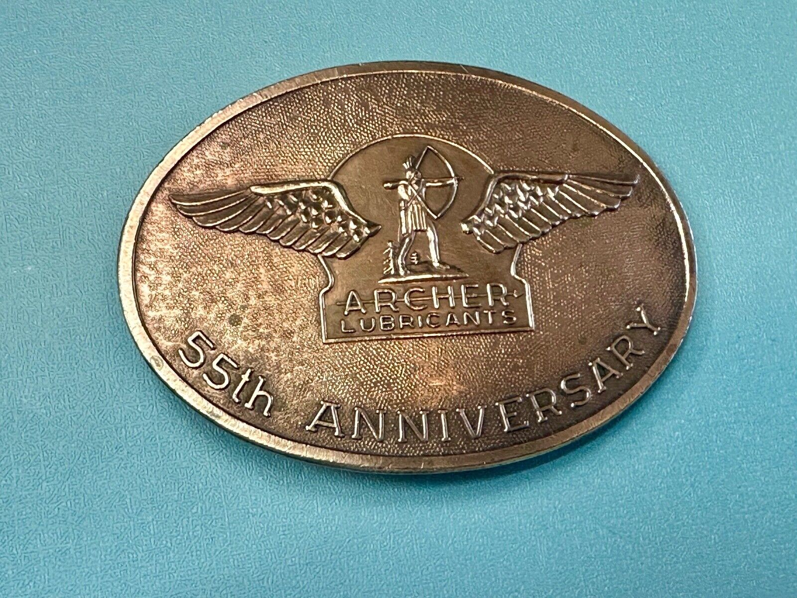 Archer Lubricants Omaha NE - Oil for farmers ranchers belt buckle